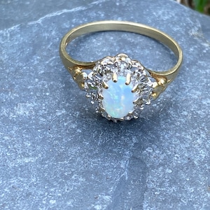 Diamond and opal 9ct gold ring, size P 7.75