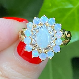 Opal and diamond 9ct gold ring size L 5.75