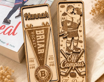 May include: Two rectangular wooden bookmarks featuring laser-engraved designs. One displays the name Hannah, a Briar Hockey pennant, and player numbers. The other shows a couple, the text Off Campus and The Deal, hockey sticks, and pucks.