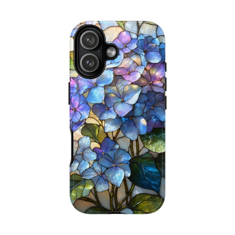 May include: A phone case featuring a stained-glass design of blue and purple hydrangea flowers with green leaves. The case has a black border and a dual-lens camera cutout.