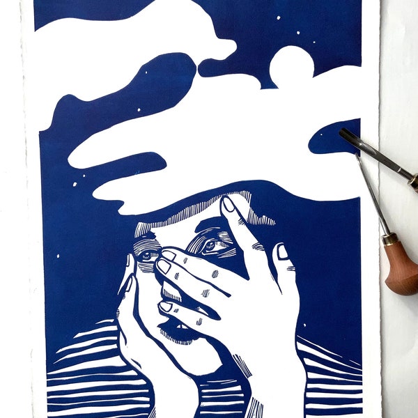Original handmade linoleum print, A3. Limited, numbered and signed. Night sky, moon, stars, clouds, face, dark blue.