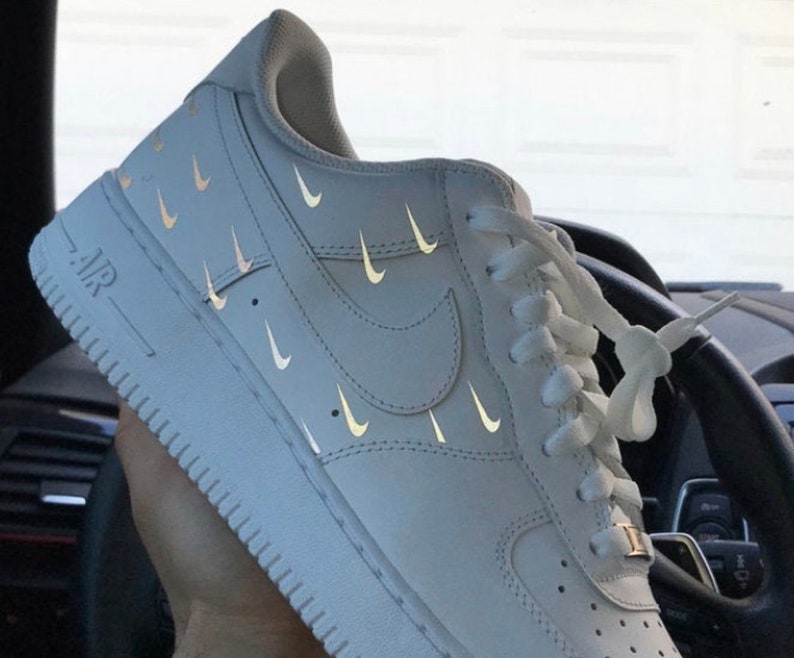 white air forces with reflective tick