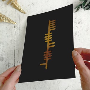 Ogham name Inscription in 24 kt gold leaf