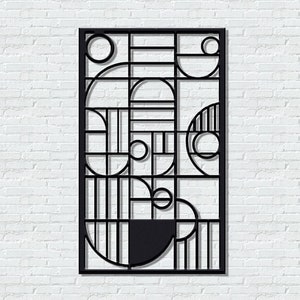May include: Black metal wall decor with a geometric design featuring circles and lines. The design is reminiscent of art deco style.