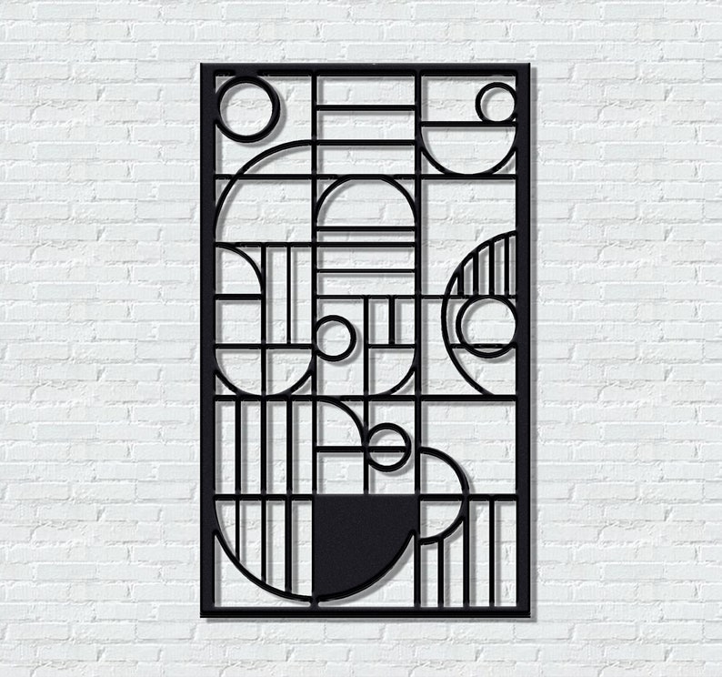 May include: Black metal wall decor with a geometric design featuring circles and lines. The design is reminiscent of art deco style.