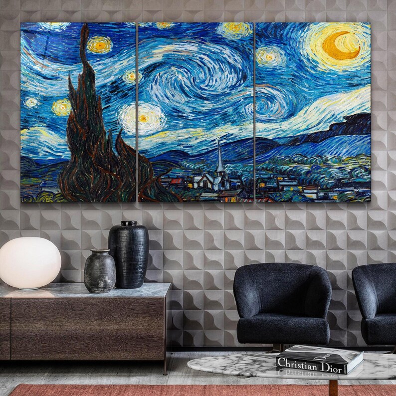 May include: A three-panel canvas print of Vincent van Gogh's "Starry Night" painting. The print features a swirling blue sky with yellow stars and a crescent moon, a dark green cypress tree, and a small village in the distance.