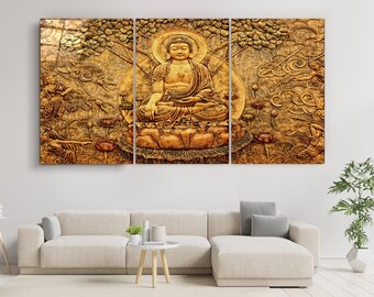 May include: A three-panel canvas print featuring a golden Buddha statue sitting in a lotus position. The statue is surrounded by intricate carvings of flowers and leaves, all in shades of gold.