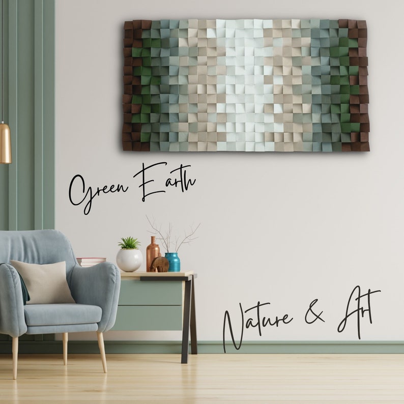 May include: A wall art piece made of wood squares in shades of green, brown, and white. The squares are arranged in a gradient pattern, creating a visual effect of depth and texture. The art piece is titled "Green Earth" and is accompanied by the text "Nature & Art".