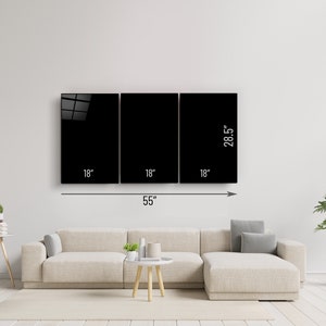 May include: Three black framed wall art pieces, each measuring 45.7 cm wide by 72.4 cm tall, arranged horizontally on a white wall. The frames are 139.7 cm wide in total.
