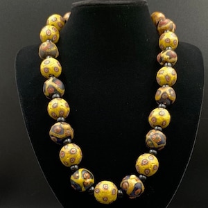 Old Venetian trade beads with faces late 1800’s old African trade beads skunk beads African glass beads glass trade beads Venetian