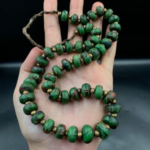 Old Venetian trade beads with faces late 1800’s old African trade beads skunk beads African glass beads glass trade beads Venetian