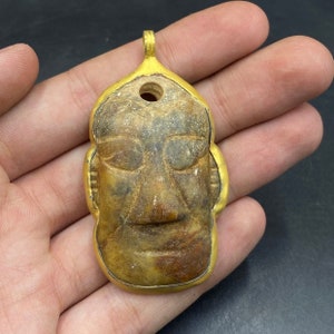 Antique jade mask covered with copper and gold painted ancient jade face pendent handcrafted from Mongolia