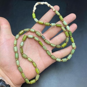 Old Venetian trade beads with faces late 1800’s old African trade beads skunk beads African glass beads glass trade beads Venetian