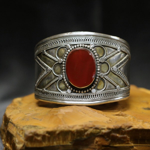 Vintage Afghani Kuchi silver and gold wash cuff bracelet with a beautiful carnelian in the middle