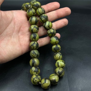 Old Venetian trade beads with faces late 1800’s old African trade beads skunk beads African glass beads glass trade beads Venetian