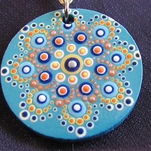 Handpainted Mandala on 1.5&quot; round wood keychain.
