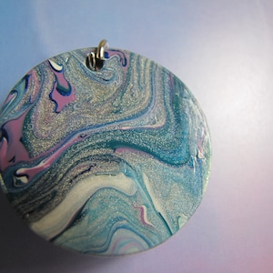 Hand Painted Abstract Pour Style on 1.5&quot; round wood keychain or necklace.