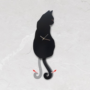 May include: Black cat silhouette wall clock with a swinging tail. The clock face is in the cat's body and the tail is the pendulum.