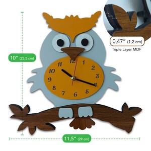 May include: A wooden owl wall clock with a yellow face and black hands. The owl is perched on a brown branch with green leaves. The clock measures 10 inches tall and 11.5 inches wide.