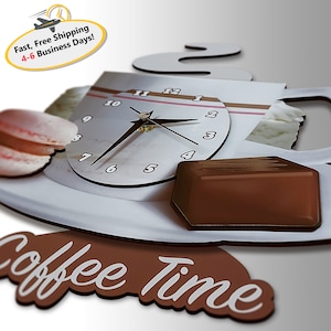 May include: A white coffee cup with a clock face and steam coming out of the top. The clock face has black hands and black numbers. There is a chocolate bar and a pink macaron on the saucer. The words "Coffee Time" are written in white on a brown background.