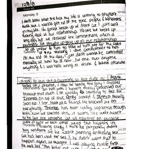 May include: A handwritten journal entry on lined paper with a black pen. The entry discusses a relationship with someone named Mark and the writer's feelings about the relationship. The entry includes the dates 12/8/18 and 12/13/18.
