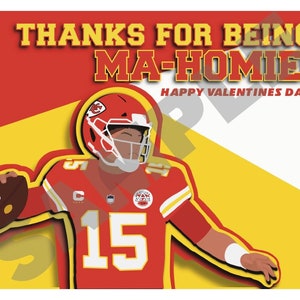 May include: A red, white, and yellow Valentine's Day card featuring a cartoon illustration of a football player wearing a red jersey with the number 15. The text on the card reads "Thanks for being Ma-Home! Happy Valentine's Day".