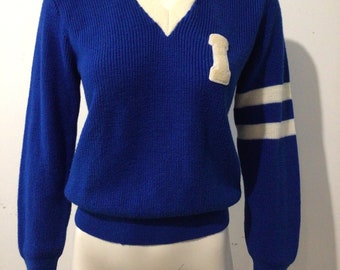Vintage unisex blue v neck school sweater. Letter, arm stripes. Pullover, wonderful condition.