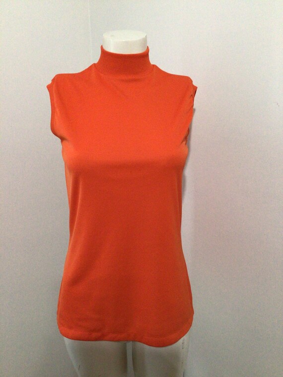 red sleeveless mock turtleneck