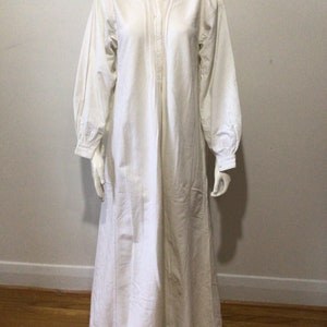 Antique Vintage French soft  thick woven linen nightgown. Tiny pleats around  cuffs and back of neck. Handmade crochet lace.