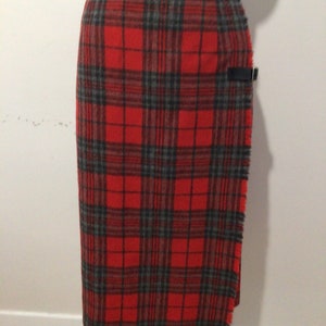 Vintage woman’s wool wraparound kilt, skirt. Pleats, leather straps, fringe, Great Britain.
