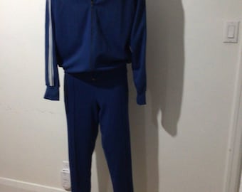 Vintage Blue Adidas tracksuit. Stirrup pants, 100% nylon, made in Korea. 3 stripes.