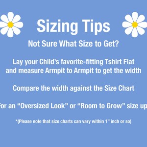 May include: A light blue graphic with white text providing sizing tips. The text advises measuring a child's favorite t-shirt from armpit to armpit to determine the width, then comparing it to a size chart. Includes daisy graphics.