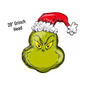 Pu&ograve; includere: Un palloncino verde a forma di testa di Grinch con un cappello di Babbo Natale rosso e bianco. Il palloncino &egrave; alto 74 cm e presenta un viso di Grinch con occhi gialli e un naso nero.