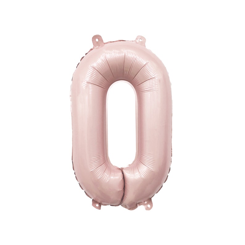May include: A rose gold foil balloon shaped like the number zero. The balloon is inflated and ready to be used for a party or celebration.