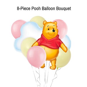 May include: An 8-piece Winnie the Pooh balloon bouquet featuring a large Winnie the Pooh balloon, two pink balloons, two yellow balloons, and two blue cloud balloons.