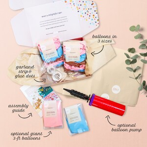 May include: A box filled with a balloon garland kit, including balloons in three sizes, a garland strip, glue dots, and an assembly guide.  The kit also includes optional giant 3-foot balloons and a balloon pump.