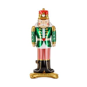 May include: A festive, inflatable Christmas nutcracker balloon. The balloon features a green and gold jacket, red and white striped pants, and black boots. The nutcracker has a gold crown and a smiling face. The balloon is standing on a gold base.