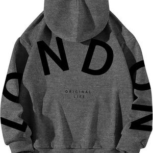 May include: A gray hooded sweatshirt with the word "LONDON" printed in black on the front and sleeves. The text "ORIGINAL LIFE" is printed in black below the word "LONDON".