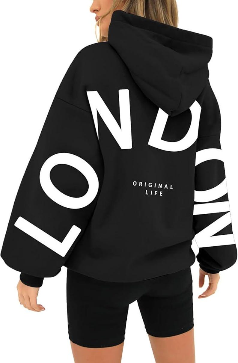 May include: Black hooded sweatshirt with the word "LONDON" printed in white on the back. The text "ORIGINAL LIFE" is printed in white below the word "LONDON".