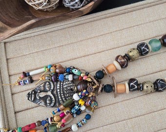 African Bone Mask Necklace | Hand-Carved Tribal Pendant | Wearable Art Necklace