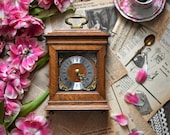 Vintage oak wooden clock. Furniture factory oisterwijk.