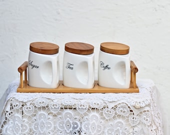 vintage set of 3 kitchen porcelain pots, spice jars for tea, sugar and coffee.