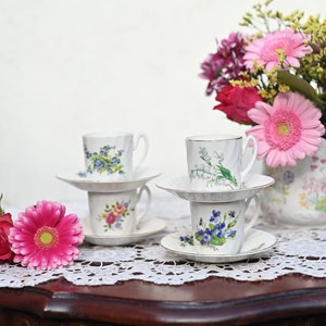 Beautiful. Delfesta Staffordshire England 4 Cups and Saucers, rare set of 4 cups with different flowers.