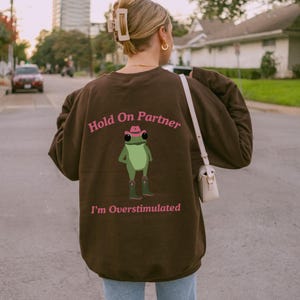 Hold On Partner Im Overstimulated Sweatshirt, Cowboy Frog Sweatshirt, Cowboy Frog Unhinged Shirt, Cute Animal Sweatshirt, Funny Frog Shirt