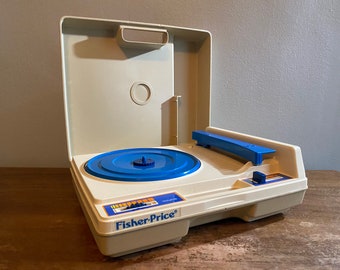 Fisher Price Record Player 1983 - Vintage Fisher Price Portable Record Player No 820 C 1983 537543745 : Fisher price music box record player vintage 1971 part of every song is played made of plastic you fisher price 33 45 rpm record player with play read books.