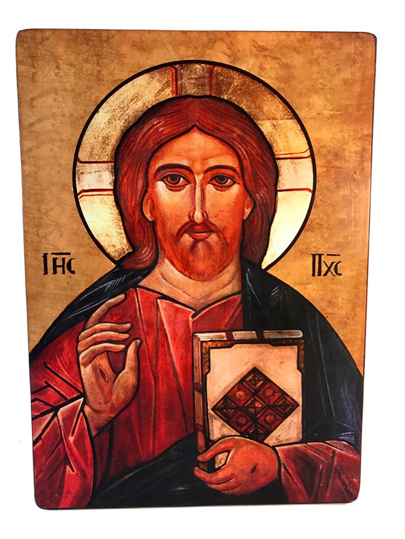 May include: A religious icon depicting Jesus Christ with a golden halo, holding a book with a red cover and a gold design. The icon has a red, gold, and blue color scheme and the text "IHC" and "IXC" is visible on the left and right sides of the image.