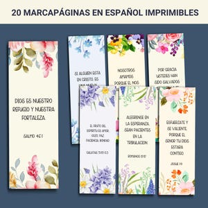 May include: A collection of printable bookmarks in Spanish, featuring floral designs and inspirational quotes. The bookmarks have a cream background with colorful flowers and text from the Bible. The text includes phrases like "God is our refuge and strength."