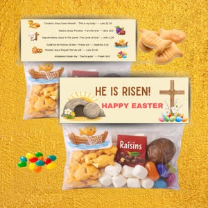 May include: Two clear plastic snack bags with printed headers. One header lists religious snack associations with text and icons. The other header features a tomb illustration, a wooden cross, and the text HE IS RISEN! HAPPY EASTER.