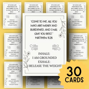 May include: A set of 30 cards with inspirational quotes and affirmations. Each card features a black and white design with floral accents and text from Matthew 11:28 and Hebrews 12:1-2. The cards promote steady breath and faith.