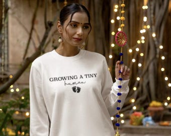 Creciendo una pequeña sudadera humana